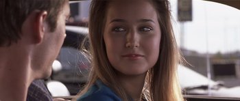 Movie still from “Joy Ride” (2001), directed by John Dahl – A person with long brown hair; Close Up shot, Over the shoulder angle