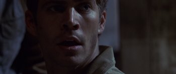 A man's face in the dark