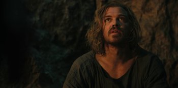 Movie still from “Barbarians” (2020), created by Arne Nolting – A person with long hair; Close Up shot, Low angle