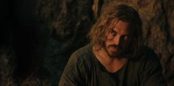 Movie still from “Barbarians” (2020), created by Arne Nolting – A person with long hair; Close Up shot, Over the shoulder angle