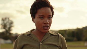 Movie still from “A League of Their Own” (2022), created by Abbi Jacobson – A person with short hair; Close Up shot, Low angle