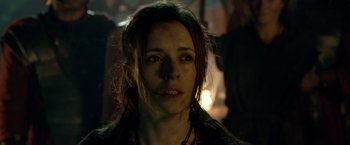 Movie still from “Pompeii” (2014), directed by Paul W.S. Anderson – A person wearing a black jacket; Close Up shot, Low angle