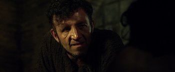 Movie still from “Pompeii” (2014), directed by Paul W.S. Anderson – A person wearing a sweater; Close Up shot, Over the shoulder angle