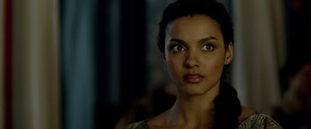 Movie still from “Pompeii” (2014), directed by Paul W.S. Anderson – A person looking at the camera; Close Up shot, Over the shoulder angle