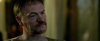 Movie still from “Pompeii” (2014), directed by Paul W.S. Anderson – A person with a beard; Close Up shot, Over the shoulder angle