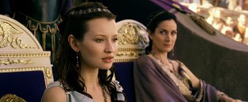 Movie still from “Pompeii” (2014), directed by Paul W.S. Anderson – Two women in medieval garb sitting next to each other; Close Up shot, Over the shoulder angle