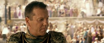 Movie still from “Pompeii” (2014), directed by Paul W.S. Anderson – A person wearing a costume; Close Up shot, Over the shoulder angle