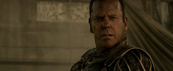 Movie still from “Pompeii” (2014), directed by Paul W.S. Anderson – A man in a military uniform; Close Up shot, Low angle