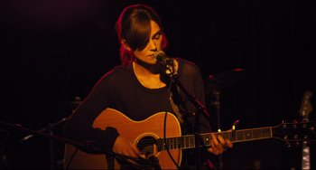 Movie still from “Begin Again” (2013), directed by John Carney – Medium shot, High angle