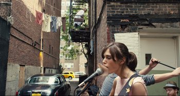Movie still from “Begin Again” (2013), directed by John Carney – Medium shot, Over the shoulder angle