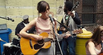 Movie still from “Begin Again” (2013), directed by John Carney – Medium shot, Over the shoulder angle