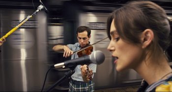 Movie still from “Begin Again” (2013), directed by John Carney – Medium shot, Low angle