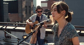 Movie still from “Begin Again” (2013), directed by John Carney – Medium shot, Over the shoulder angle