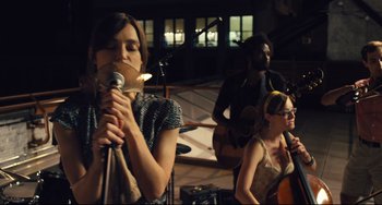 Movie still from “Begin Again” (2013), directed by John Carney – Medium shot, High angle