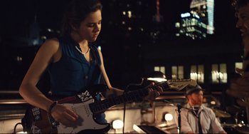 Movie still from “Begin Again” (2013), directed by John Carney – Medium shot, Over the shoulder angle