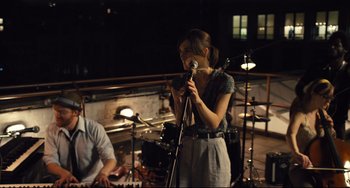 Movie still from “Begin Again” (2013), directed by John Carney – Medium shot, High angle