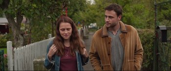 Movie still from “Berlin Syndrome” (2017), directed by Cate Shortland – A man and a woman walking down a sidewalk; Medium shot, Over the shoulder angle