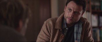 Movie still from “Berlin Syndrome” (2017), directed by Cate Shortland – A person wearing a jacket; Close Up shot, Over the shoulder angle