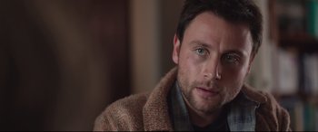 Movie still from “Berlin Syndrome” (2017), directed by Cate Shortland – A person wearing a jacket; Close Up shot, Over the shoulder angle