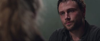 Movie still from “Berlin Syndrome” (2017), directed by Cate Shortland – A person looking at the camera; Close Up shot, Over the shoulder angle