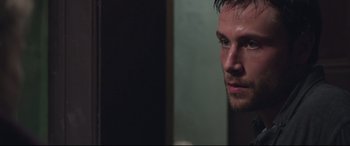 Movie still from “Berlin Syndrome” (2017), directed by Cate Shortland – A person looking at a mirror; Close Up shot, Low angle