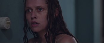 Movie still from “Berlin Syndrome” (2017), directed by Cate Shortland – A person with wet hair; Close Up shot, Low angle