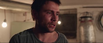 Movie still from “Berlin Syndrome” (2017), directed by Cate Shortland – A person with his eyes closed; Close Up shot, Over the shoulder angle