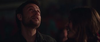 Movie still from “Berlin Syndrome” (2017), directed by Cate Shortland – A man and a woman are looking up at the sky; Close Up shot, Low angle