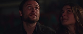 Movie still from “Berlin Syndrome” (2017), directed by Cate Shortland – A person looking up at something; Close Up shot, Low angle