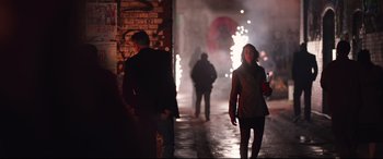 Movie still from “Berlin Syndrome” (2017), directed by Cate Shortland – A woman walking down a street at night; Wide shot, Over the shoulder angle