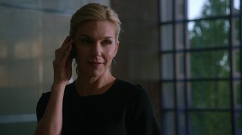 Movie still from “Better Call Saul” (2015), created by Vince Gilligan – A woman in a black shirt talking on a cell phone; Close Up shot, Over the shoulder angle