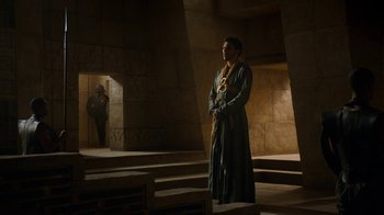 Movie still from “Game of Thrones” (2011), created by D.B. Weiss – A man standing in the middle of an empty room; Wide shot, Low angle