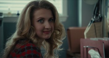 Movie still from “Win Win” (2011), directed by Tom McCarthy – A person with long blonde hair; Close Up shot, Over the shoulder angle