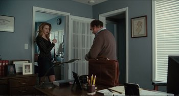 Movie still from “Win Win” (2011), directed by Tom McCarthy – A man and a woman standing in front of each other; Medium shot, Over the shoulder angle