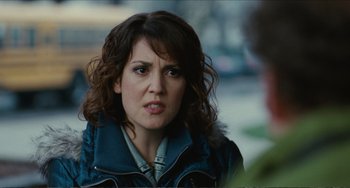 Movie still from “Win Win” (2011), directed by Tom McCarthy – A person with curly hair; Close Up shot, Over the shoulder angle