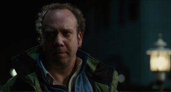 Movie still from “Win Win” (2011), directed by Tom McCarthy – A person wearing a jacket; Close Up shot, Over the shoulder angle