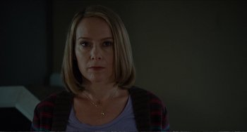 Movie still from “Win Win” (2011), directed by Tom McCarthy – A person wearing a necklace; Close Up shot, Over the shoulder angle