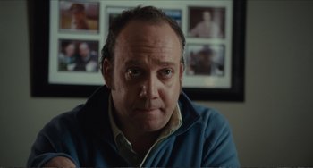 Movie still from “Win Win” (2011), directed by Tom McCarthy – A person wearing a blue jacket; Close Up shot, Over the shoulder angle