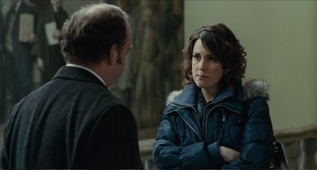 Movie still from “Win Win” (2011), directed by Tom McCarthy – A man and a woman are talking to each other; Medium shot, Over the shoulder angle