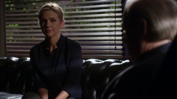 Movie still from “Better Call Saul” (2015), created by Vince Gilligan – A woman sitting on top of a couch in front of a man; Close Up shot, Over the shoulder angle