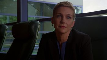 Movie still from “Better Call Saul” (2015), created by Vince Gilligan – A woman sitting in a chair in front of a window; Close Up shot, Over the shoulder angle