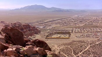 Movie still from “2 Fast 2 Furious” (2003), directed by John Singleton – An aerial view of an area in the middle of the desert; Extreme Wide shot, High angle