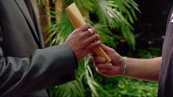 Movie still from “2 Fast 2 Furious” (2003), directed by John Singleton – A man and a woman exchanging wedding rings; Extreme Close Up shot, High angle