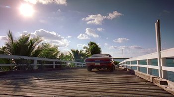 Movie still from “2 Fast 2 Furious” (2003), directed by John Singleton – A car is parked on a wooden bridge; Extreme Wide shot, Low angle