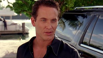Movie still from “2 Fast 2 Furious” (2003), directed by John Singleton – A person wearing a black shirt; Close Up shot, Low angle
