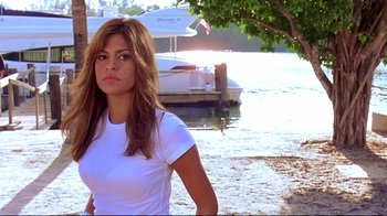 Movie still from “2 Fast 2 Furious” (2003), directed by John Singleton – A beautiful young woman standing next to a body of water; Close Up shot, Low angle