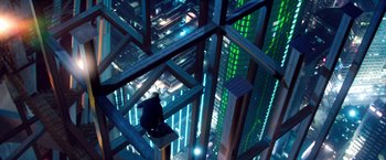Movie still from “6 Underground” (2019), directed by Michael Bay – A man sitting on top of a metal structure in a building; Extreme Wide shot, Overhead angle