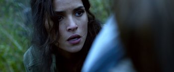 Movie still from “6 Underground” (2019), directed by Michael Bay – A person looking at the camera; Close Up shot, Over the shoulder angle