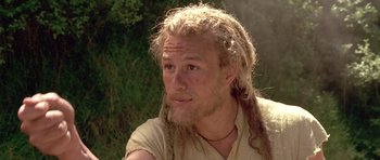 Movie still from “A Knight's Tale” (2001), directed by Brian Helgeland – A person with long blonde hair; Close Up shot, Low angle