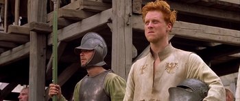 Movie still from “A Knight's Tale” (2001), directed by Brian Helgeland – Two men dressed up in medieval costumes; Medium shot, Low angle
